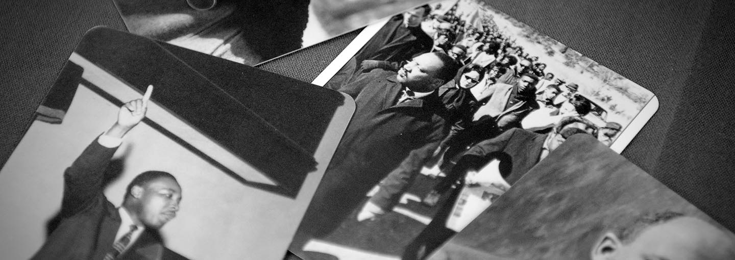 Several black and white photos of Martin Luther King, Jr.