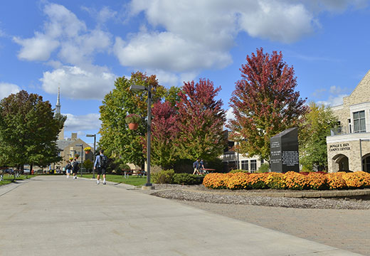 Fall foliage between Campus Center and Kearney Hall.