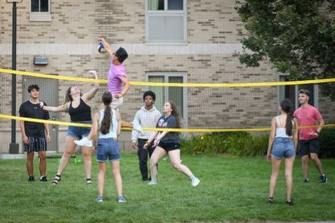 Students play volleyball during Welcome Weekend.